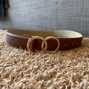 Express synthetic leather belt with gold colored clasp